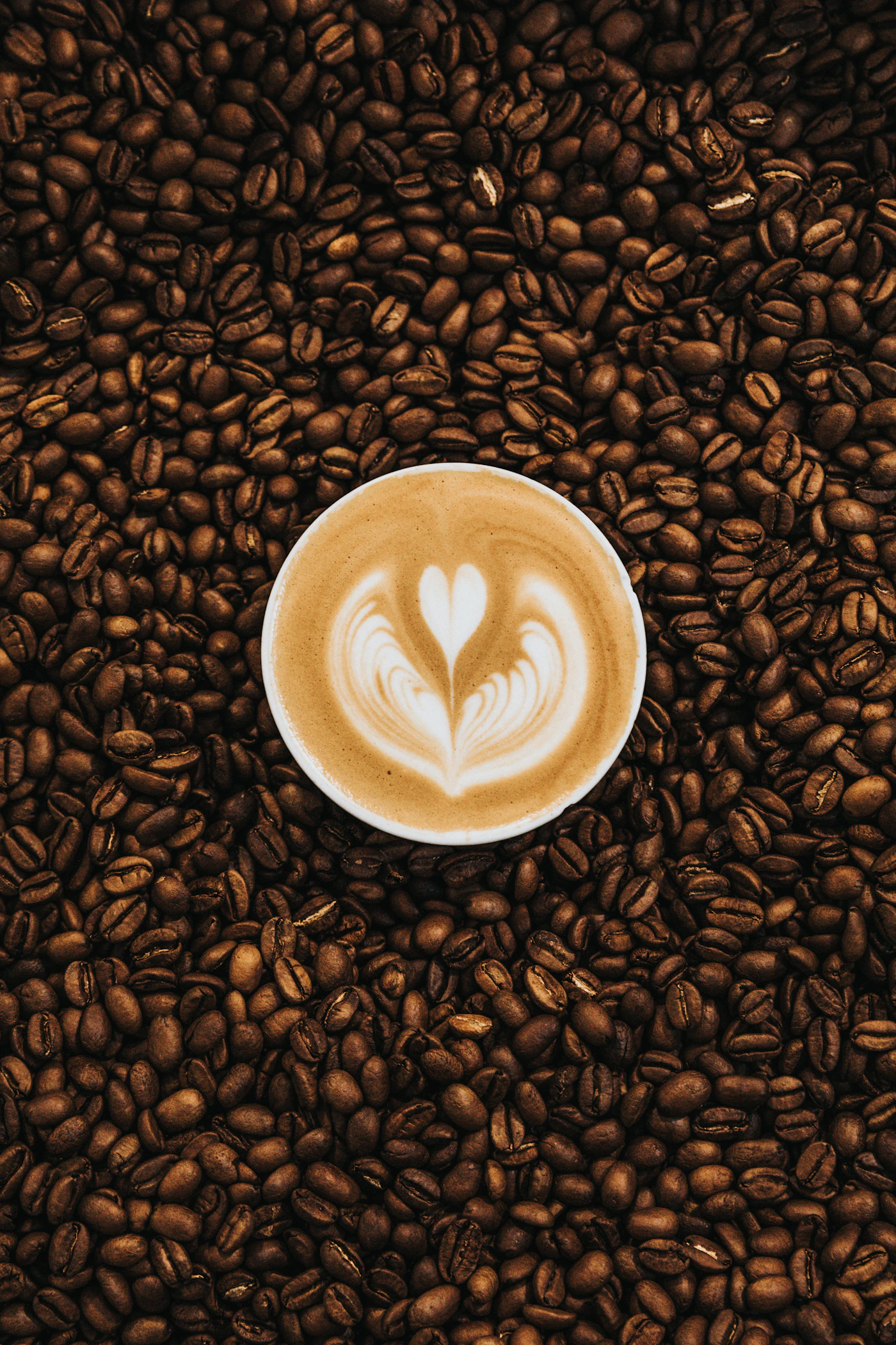 Kopi susu dingin dengan es